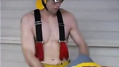 Hunky Firefighter In Uniform