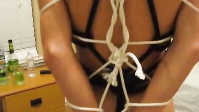Tied up and fucked by a muscular Asian guy in the bedroom!