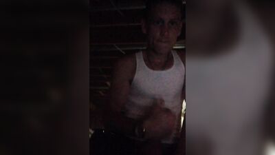 Friend jerking off in the gym after a hard workout.