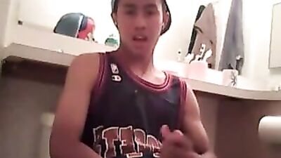 Hot Asian college ki*d jacking it on cam in the bathroom