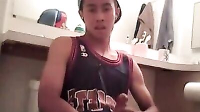 Hot Asian college ki*d jacking it on cam in the bathroom