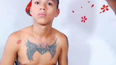 Hot latino smooth and tatoued gets sucked by her friend