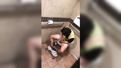 Cute store employee cums in the bathroom