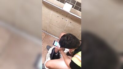 Cute store employee cums in the bathroom