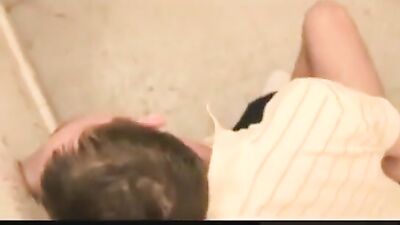 Public Glory Hole Fun with Twink - A Young twink has fun with two guys in a glory hole in public WC.