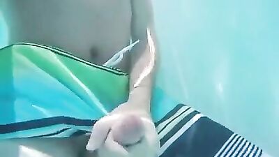 Young guy shoots his load in pool becomes the new hot gay porn scene!