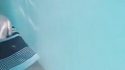 Young guy shoots his load in pool becomes the new hot gay porn scene!