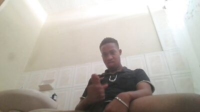 Strokes his dick
