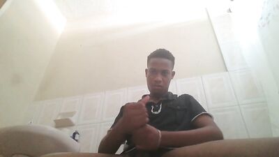 Strokes his dick