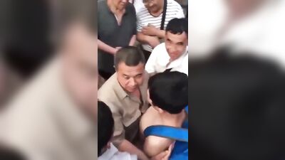 Chinese Boy Gets Used by Crowd of Horny Older Men!