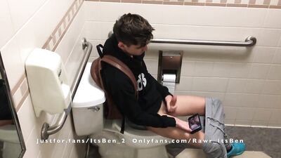 Young 18 year old twink teen having fun in the restroom between class.