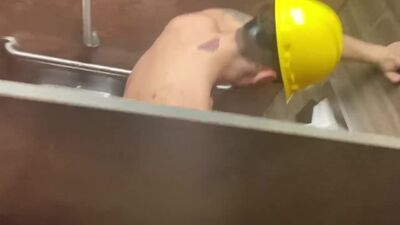 Daniel HAUSSER sucks off construction worker in public bathroom