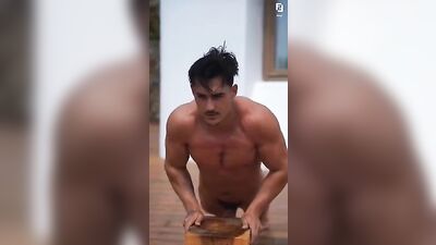 Muscle Jock Works outside Nude on Rooftop