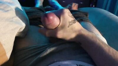 A young guy caresses his dick