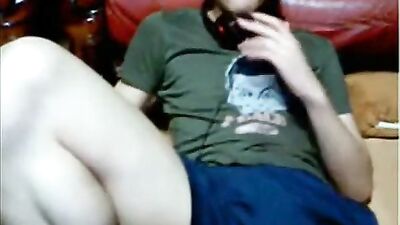 Asian twink plays with cock