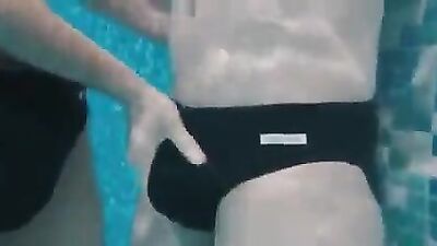 Helping hand in the pool becomes Jerking me friend in the pool as an amateur cum shot fetish video.