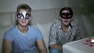 Blond boy plays with a friend