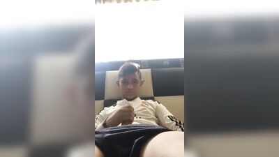 Latino boy fan of soccer masturbates on his bed