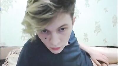 A very attractive blonde masturbates