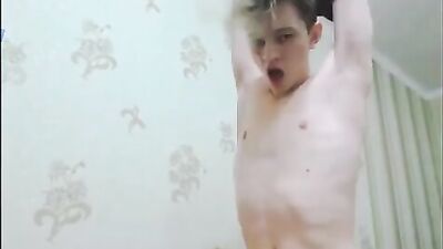 A very attractive blonde masturbates