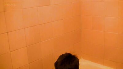 Bathroom Cutie showers and cums