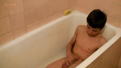 Bathroom Cutie showers and cums