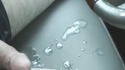 Athlete jerks off and cums behind the wheel