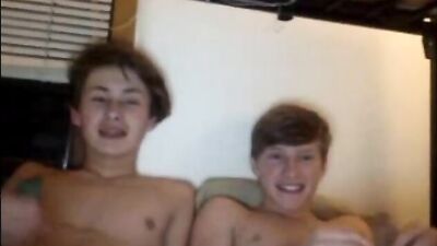 Two boys masturbates on a bunk bed