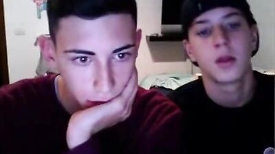 Two very beautiful boys masturbates in the bedroom: The Ultimate Handjob Experience