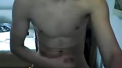 Hunk in a hoodie: Web-Cam Solo Revealed! (190 chars)