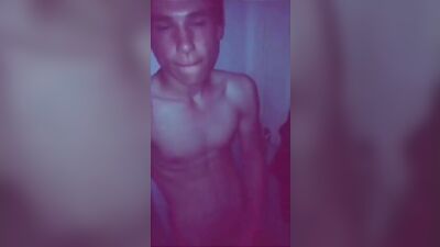 Horny twink stroking his cock