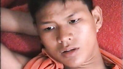 Thai cutie wanks to porn