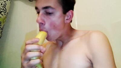Handsome Teen Sucks Banana, Fks It, Then Cums On It