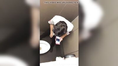 Geezer wanking in the toilets