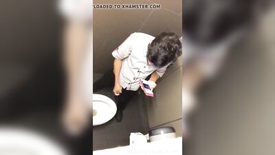 Geezer wanking in the toilets