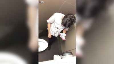 Geezer wanking in the toilets