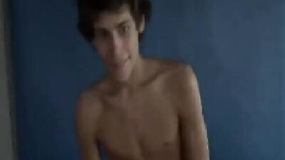 Slim boy wanks his monster cock and cums hard in this hot new gay porn video!