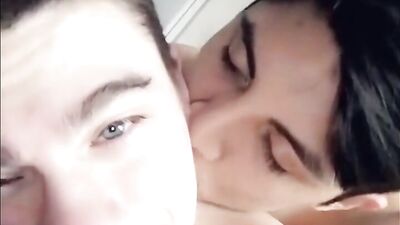 Tender boys kiss
