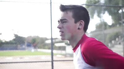 Two baseball boys having fun