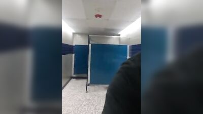 Teen jacks in school bathroom