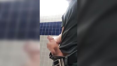 Teen jacks in school bathroom
