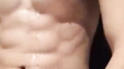 Young Cutie with Six-Pack Explodes in Raw Jizz Fest!