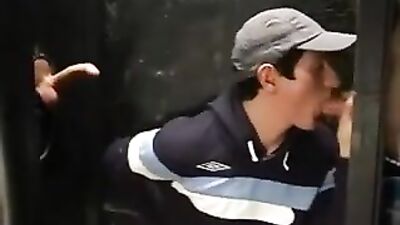 Glory Hole Passion: Brit Lads in Three-Way Action