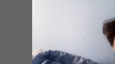 Boy drops a load into a condom