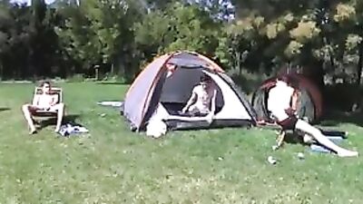 Gay Campers Get Busy with Bareback Action Group Sex (Note: 281 characters without spaces)