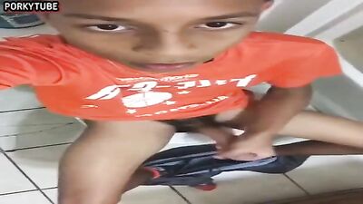 Handsome slim black teen wanks