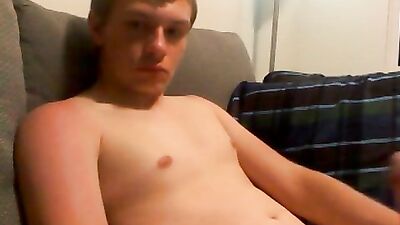 Blonde puts lotion on his sunburn