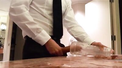 Business guy fills fleshlight with cum