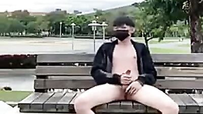 Outdoor Pleasures: Asian Amateur Jerks Off in Public!