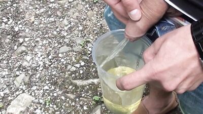 Twink Pissing In A Cup